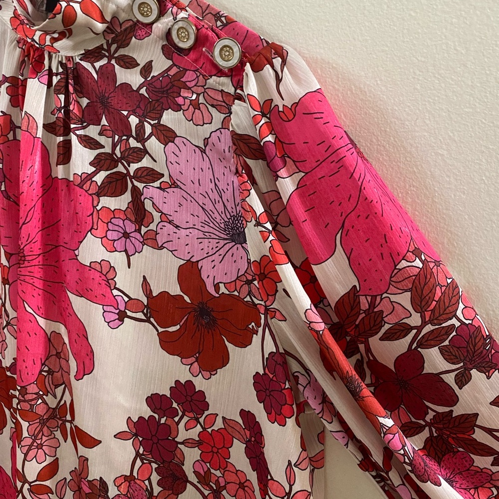Floral top with side buttons